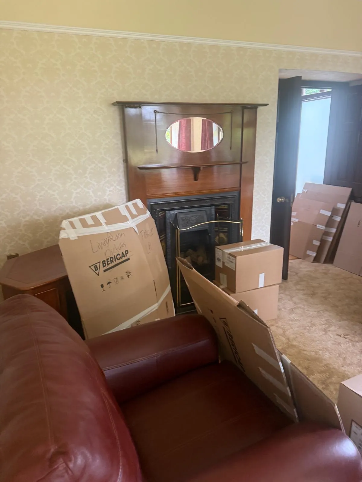 Boxes and wrapping materials packed for a move in Keighley